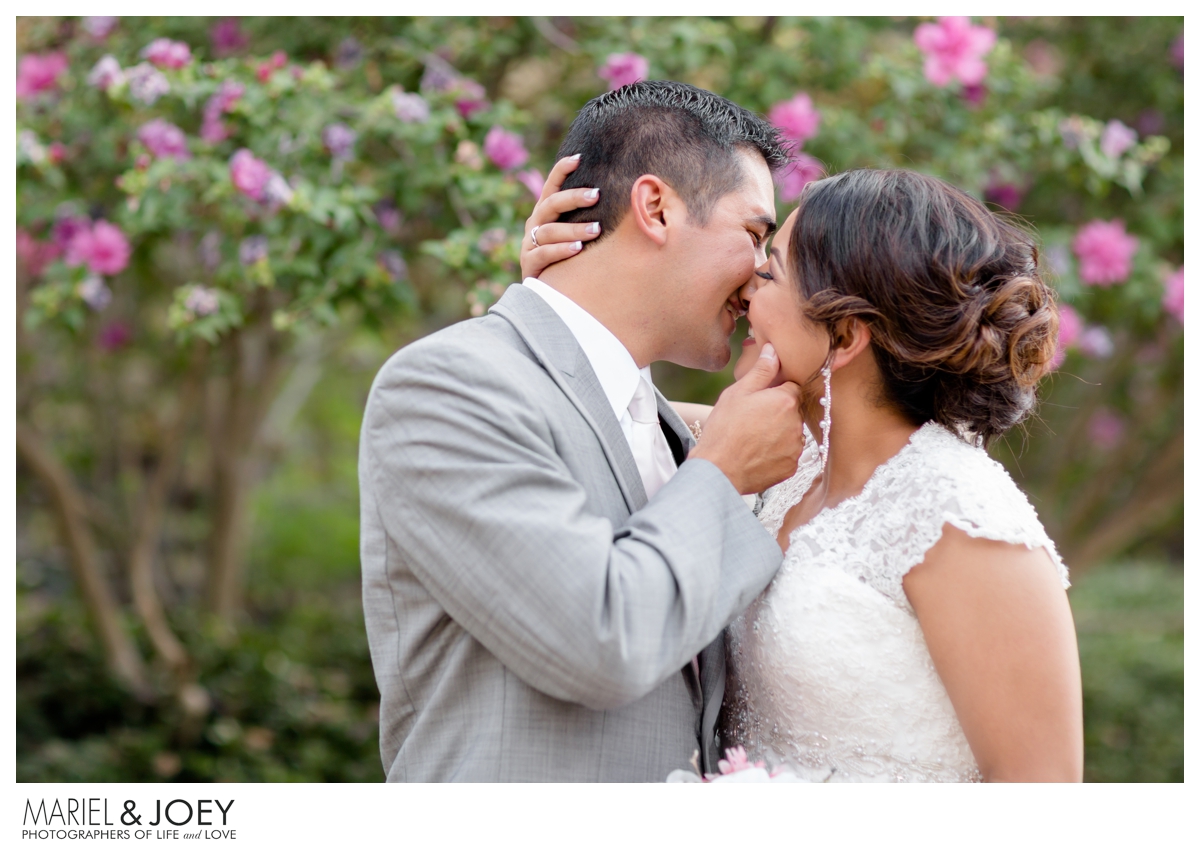 Mariel and Joey: Fort Worth Wedding Photographers Couple Sharing a Kiss